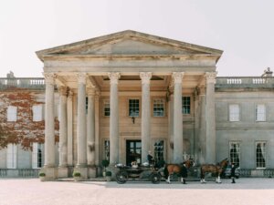 bride and groom in front of the wynyard hall
