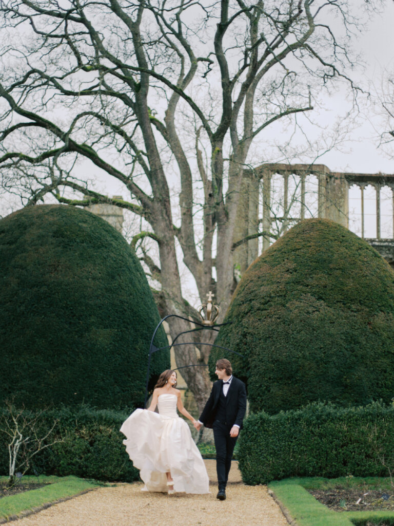 Newlyweds Sam and Tamika celebrating their wedding at Sudeley Castle